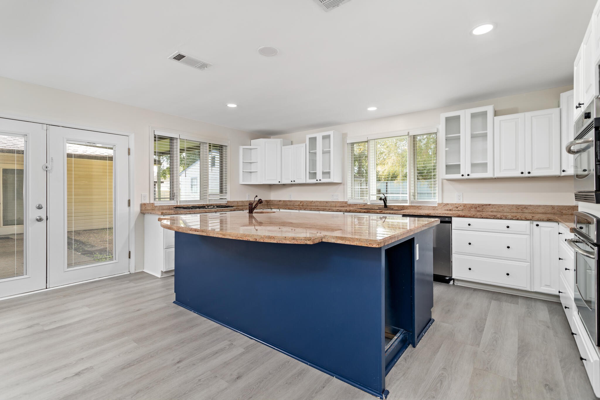 4455 Arthur Street Beaumont, TX 77706 - Photo 11 of 23 a kitchen with stainless steel appliances granite countertop a sink stove and cabinets