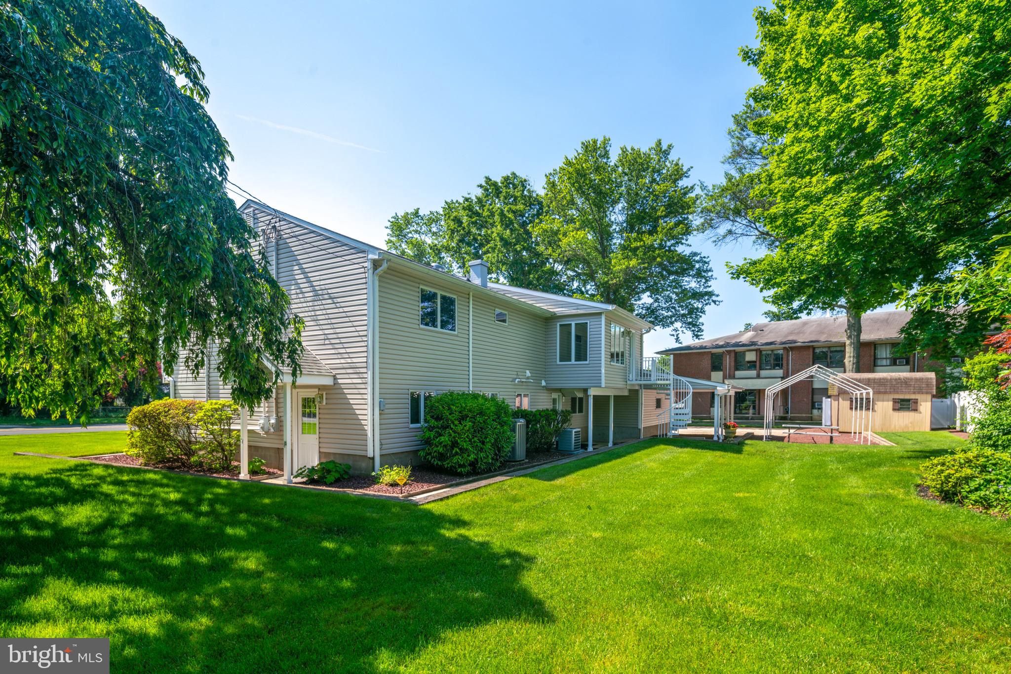 2041 Pennington Road Trenton, NJ 08618 - Photo 36 of 39 a view of a house with a yard and sitting area