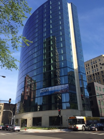 a front view of a building with street view
