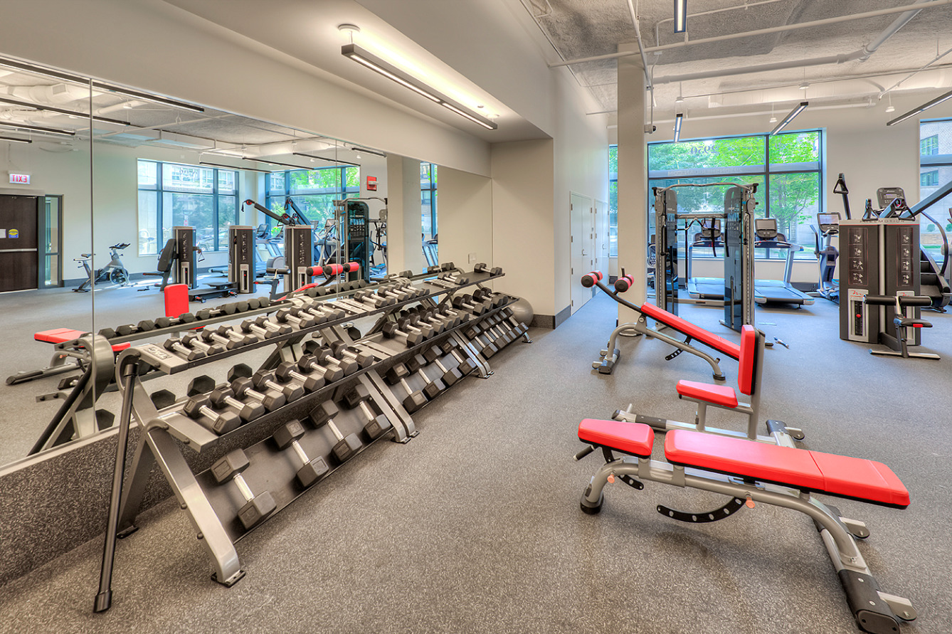 Undisclosed Address Chicago, IL 60657 - Photo 11 of 14 a room with gym equipment