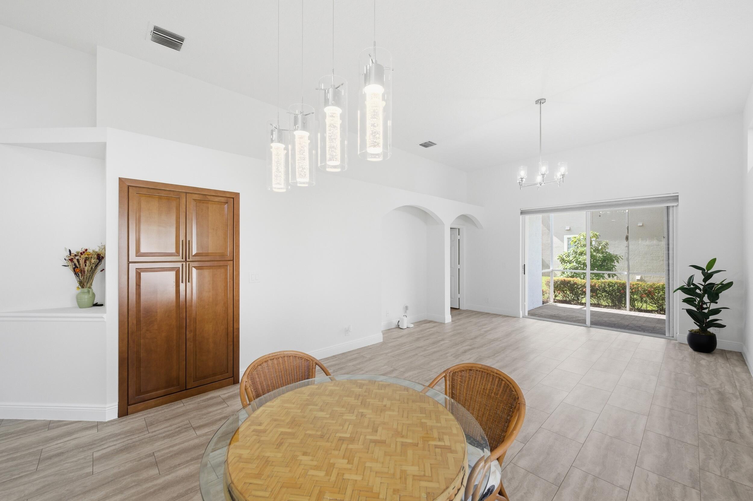 8534 Vía D Oro Boca Raton, FL 33433 - Photo 21 of 34 a view of a livingroom with furniture and wooden floor