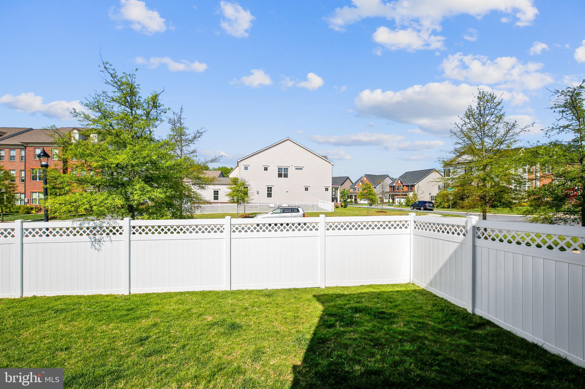 13376 Redspire Drive Silver Spring, MD 20906 - Photo 9 of 67 Privacy fencing around a flat & grassy yard!