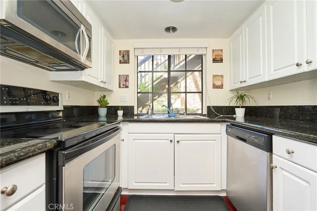 $590,000 | 25591 Indian Hill Lane, Unit E, Laguna Hills, CA 92653