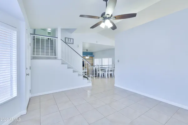 a view of entryway and hall with a workspace