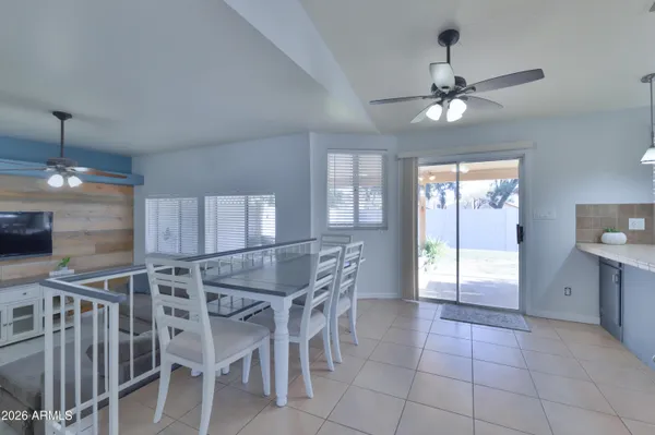 a view of a kitchen and dining room