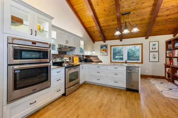 a dining room with furniture window wooden floor