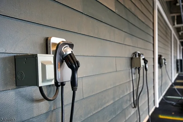 a dining room with furniture entryway and wooden floor
