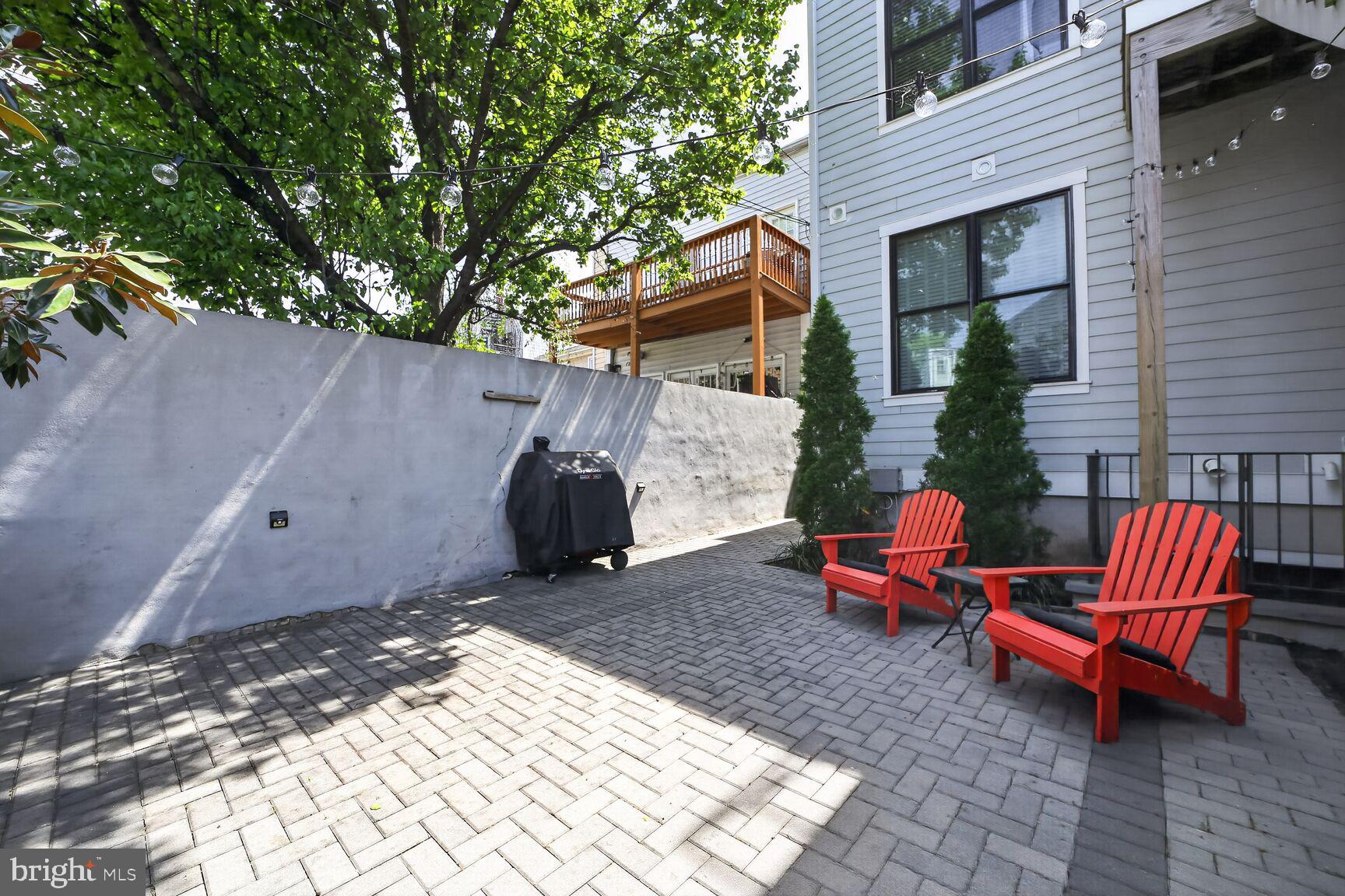 1232 I Street Northeast, Unit 1 Washington, DC 20002 - Photo 12 of 59 Charming patio with vibrant seating.