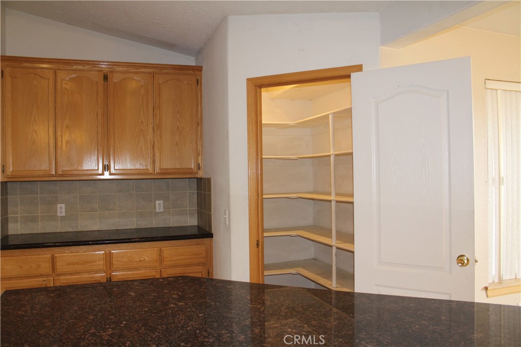 16263 Chiwi Road Apple Valley, CA 92307 - Photo 11 of 40 a view of walk in closet