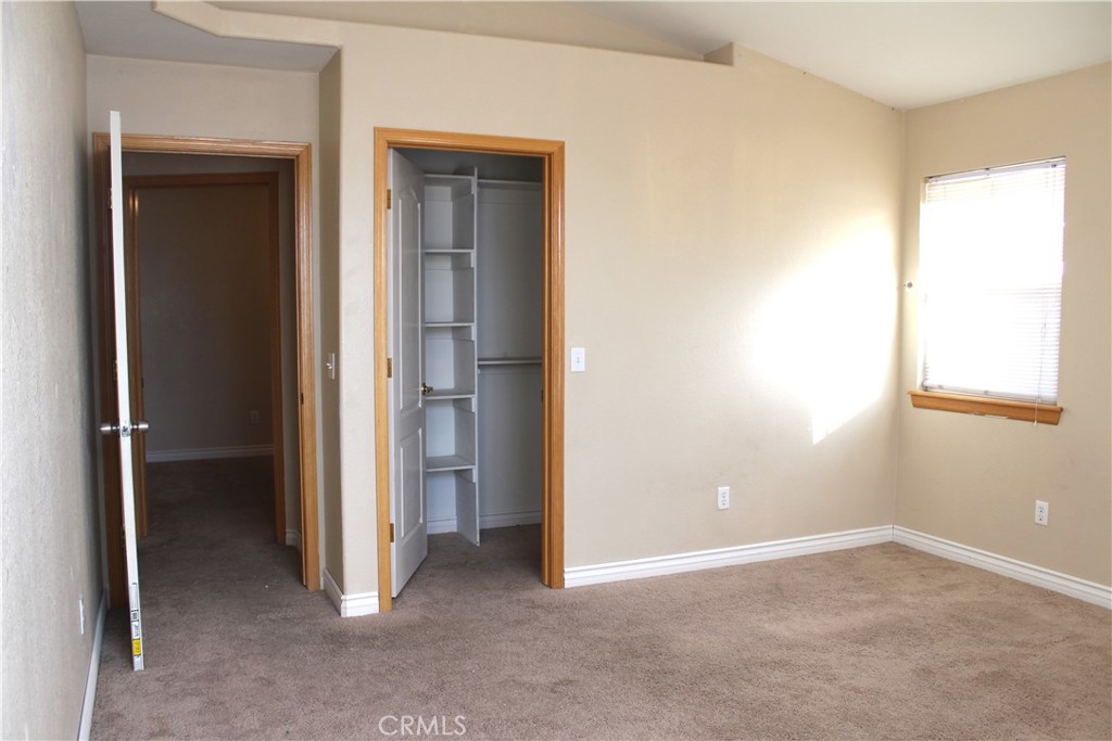 16263 Chiwi Road Apple Valley, CA 92307 - Photo 27 of 40 an empty room that has a window in it