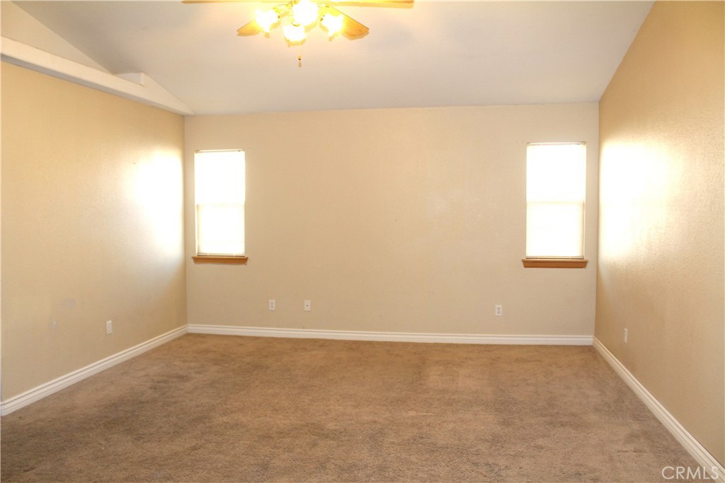 16263 Chiwi Road Apple Valley, CA 92307 - Photo 33 of 40 a view of an empty room and window