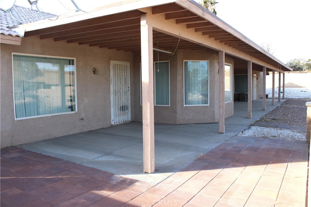 16263 Chiwi Road Apple Valley, CA 92307 - Photo 40 of 40 a view of a house with backyard