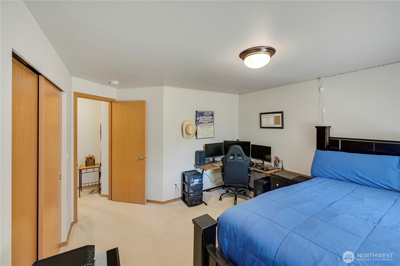 31 2nd Street Port Hadlock, WA 98339 - Photo 28 of 38 a bedroom with a bed and wooden floor