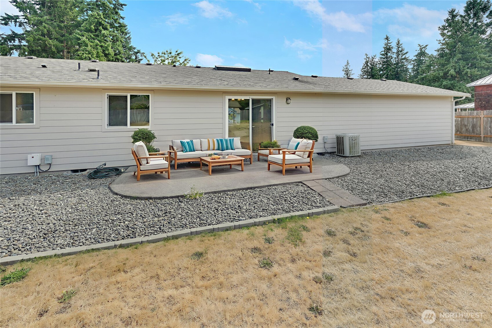 31 2nd Street Port Hadlock, WA 98339 - Photo 5 of 38 a view of two chairs in the backyard