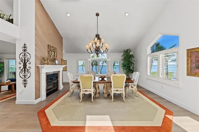 a view of a chair and tables in the balcony