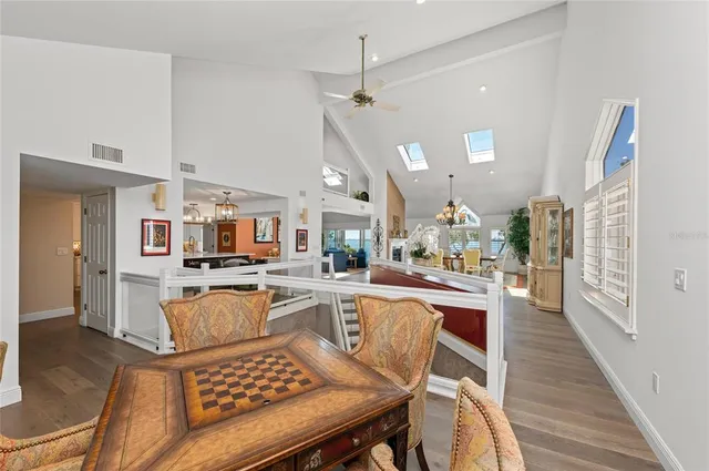 a view of walk in closet with clothes