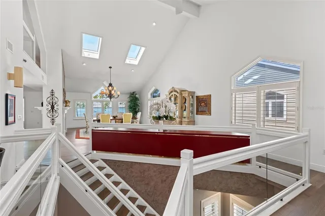 a view of an empty room with a potted plant