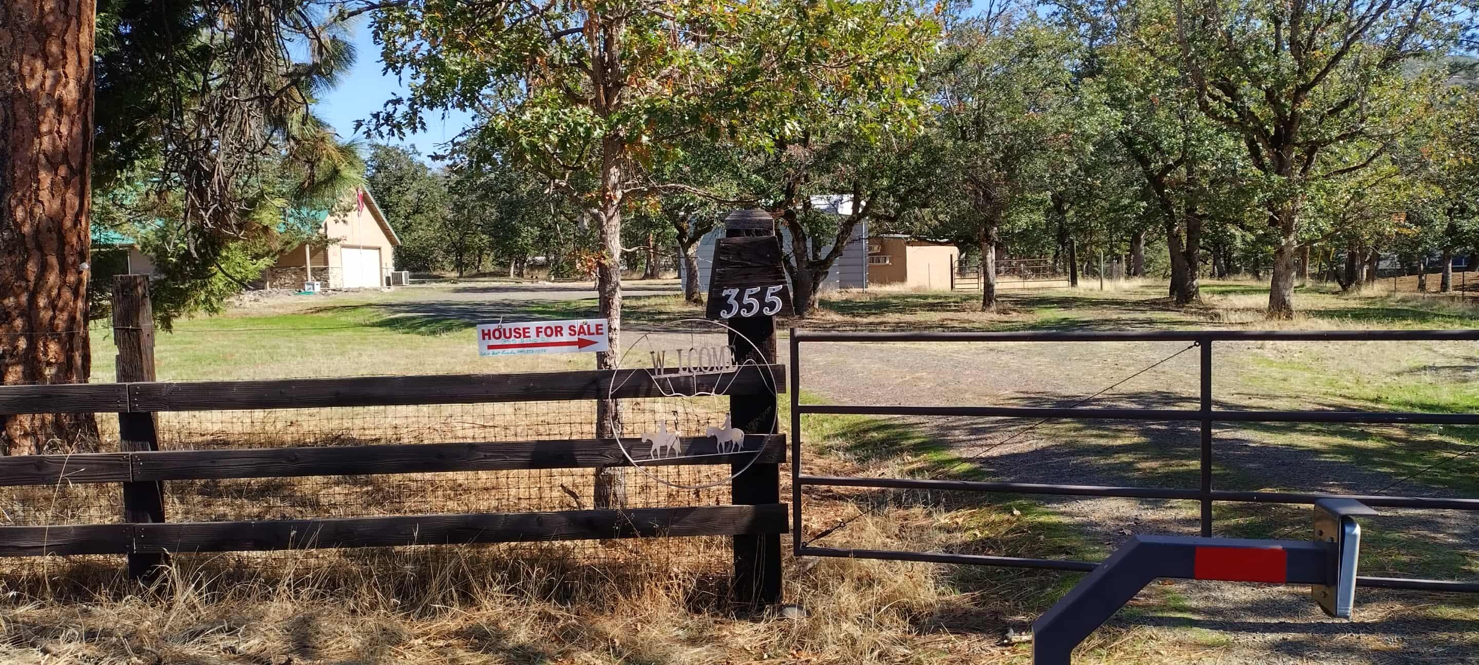 355 Bond Road Shady Cove, OR 97539 - Photo 26 of 29 view outide gate showing sign