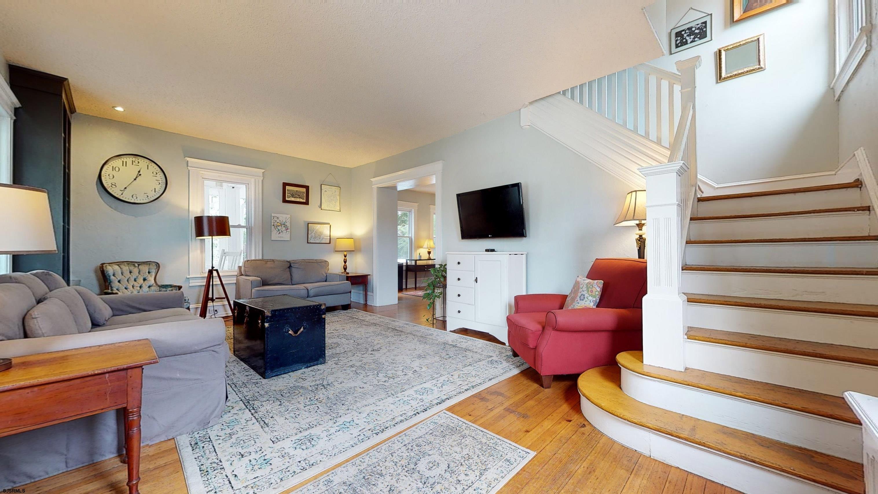 1409 Shore Road Northfield, NJ 08225 - Photo 11 of 50 a living room with furniture and a flat screen tv