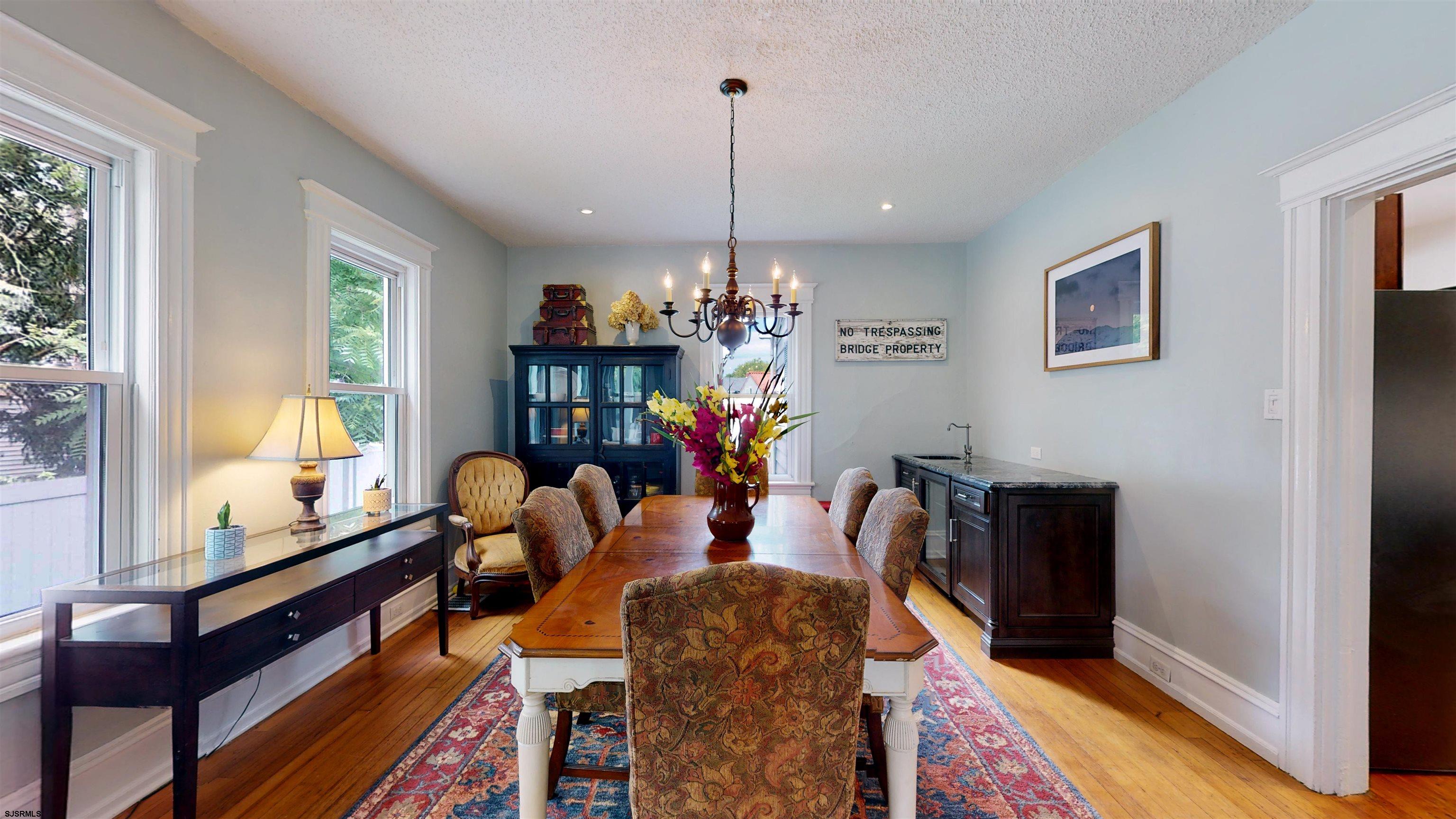 1409 Shore Road Northfield, NJ 08225 - Photo 16 of 50 a living room with furniture and a window