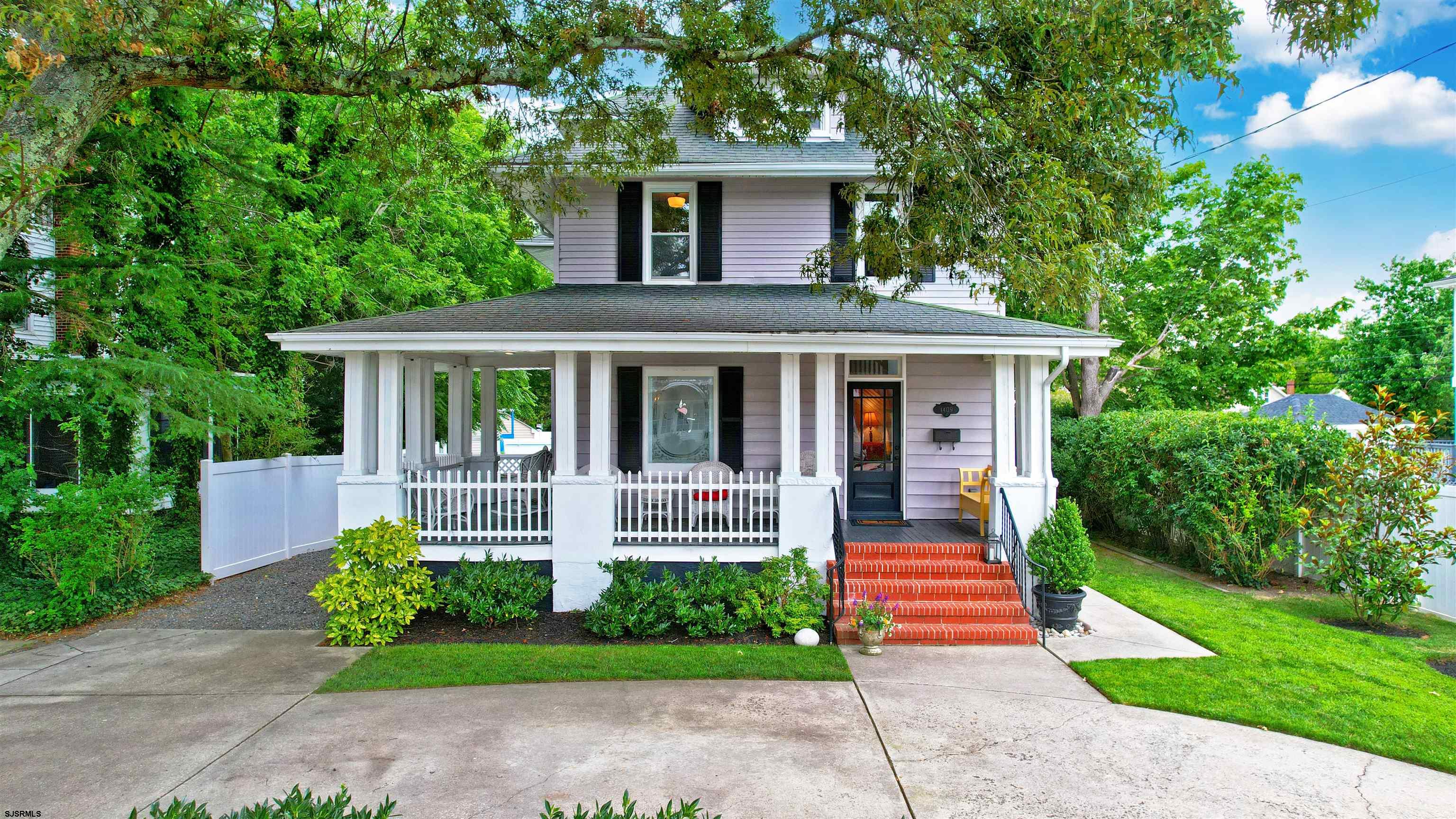 1409 Shore Road Northfield, NJ 08225 - Photo 2 of 50 a front view of house with yard and green space