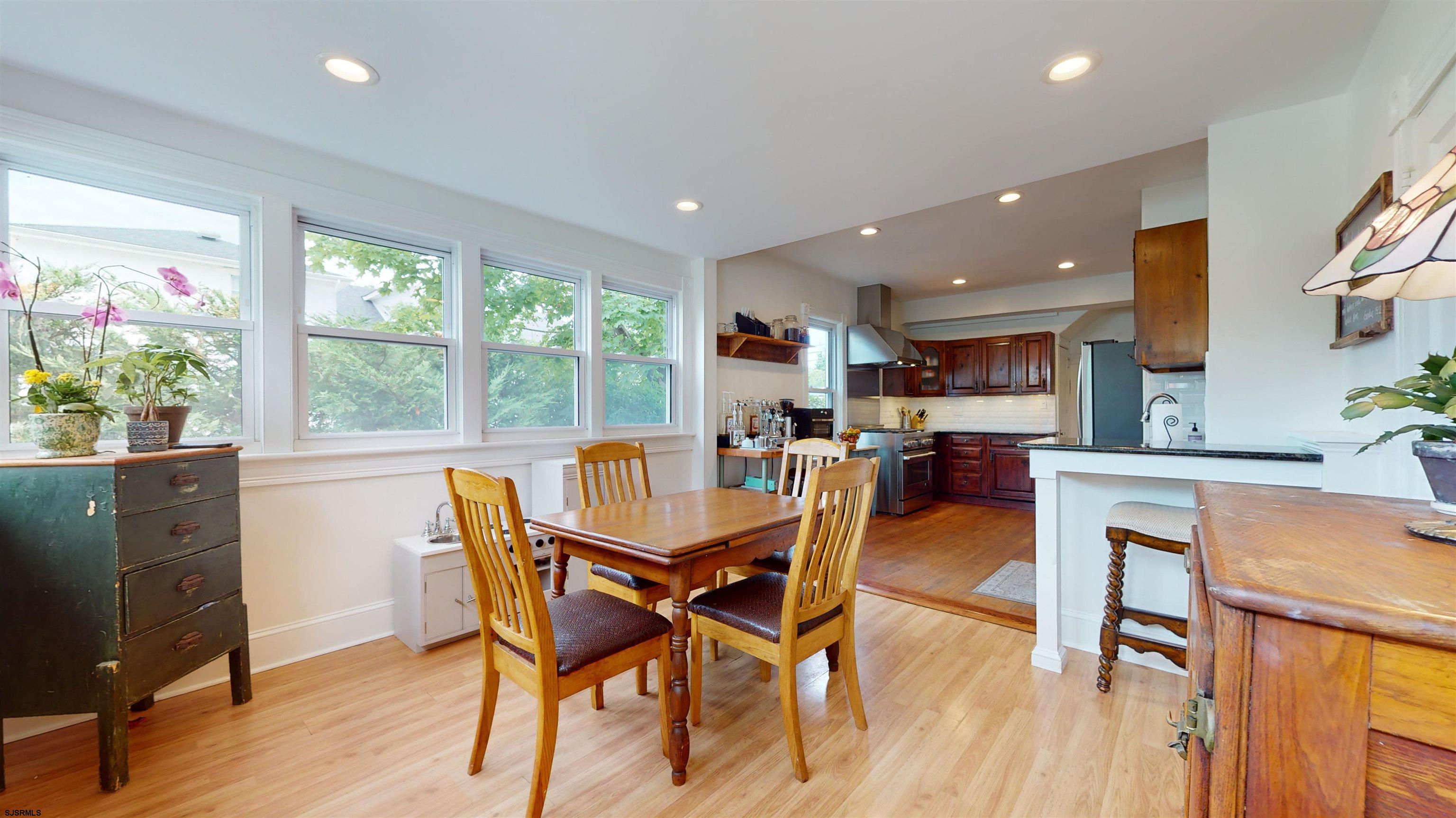 1409 Shore Road Northfield, NJ 08225 - Photo 25 of 50 a dining room with furniture and wooden floor