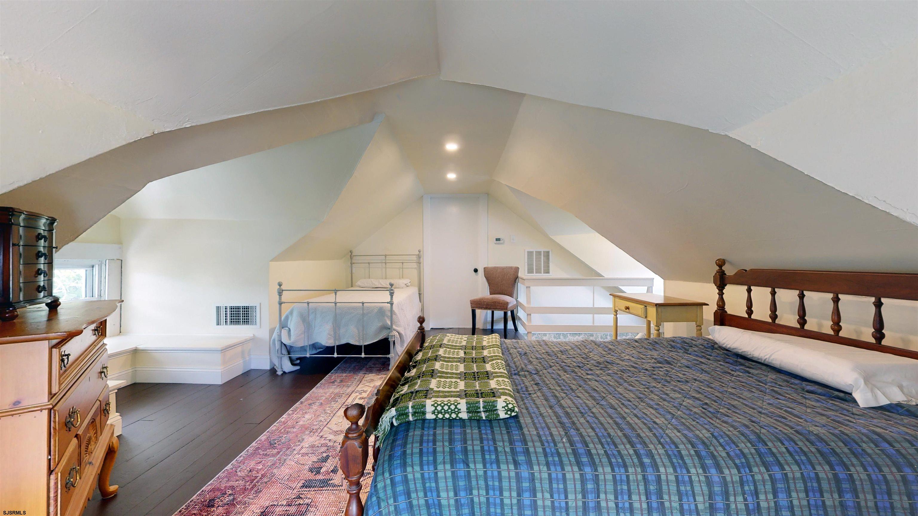 1409 Shore Road Northfield, NJ 08225 - Photo 35 of 50 a living room with furniture and a wooden floor