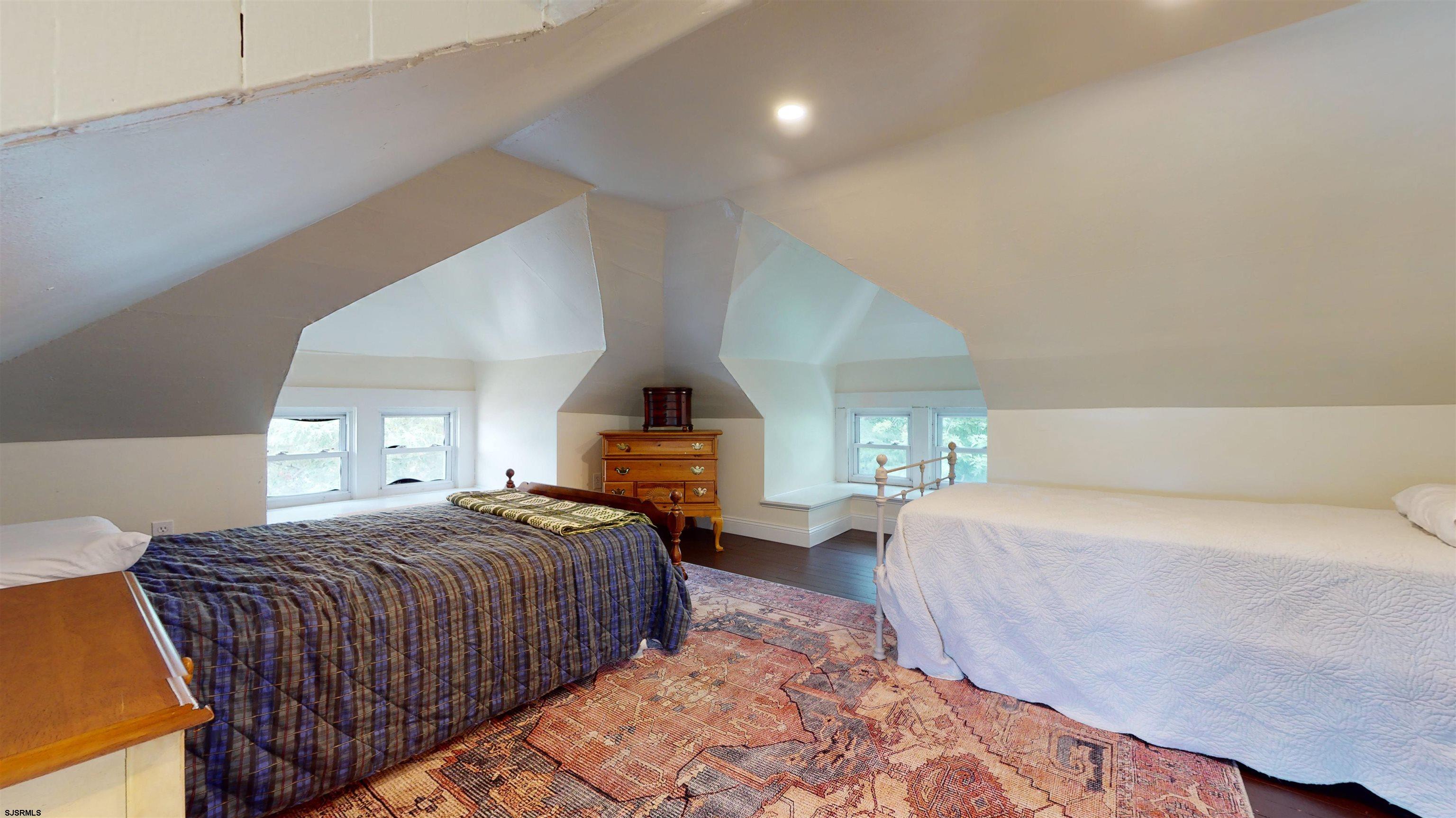 1409 Shore Road Northfield, NJ 08225 - Photo 36 of 50 a bedroom with a bed window and couch