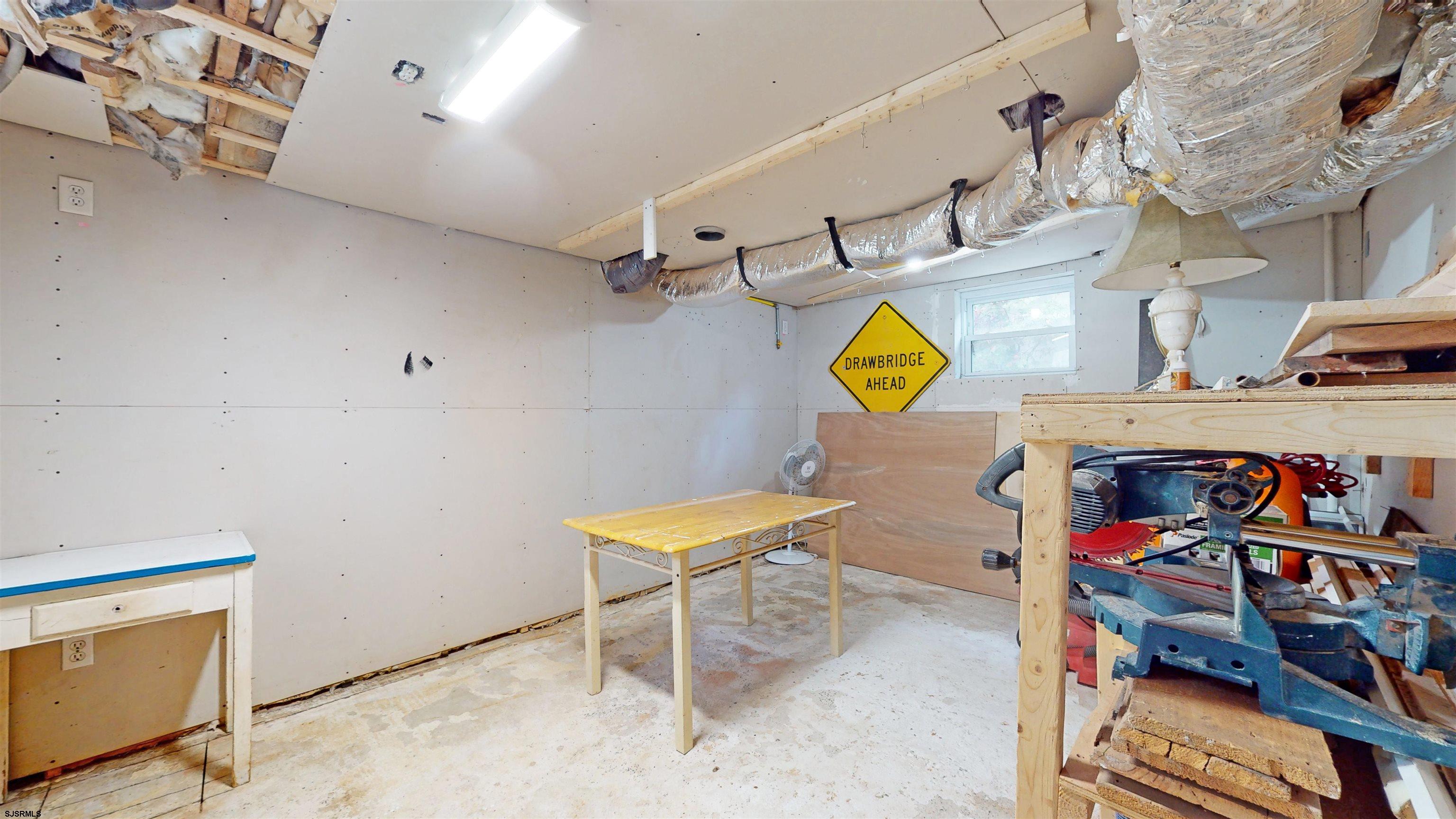 1409 Shore Road Northfield, NJ 08225 - Photo 37 of 50 a outdoor space with lots of furniture and clutter