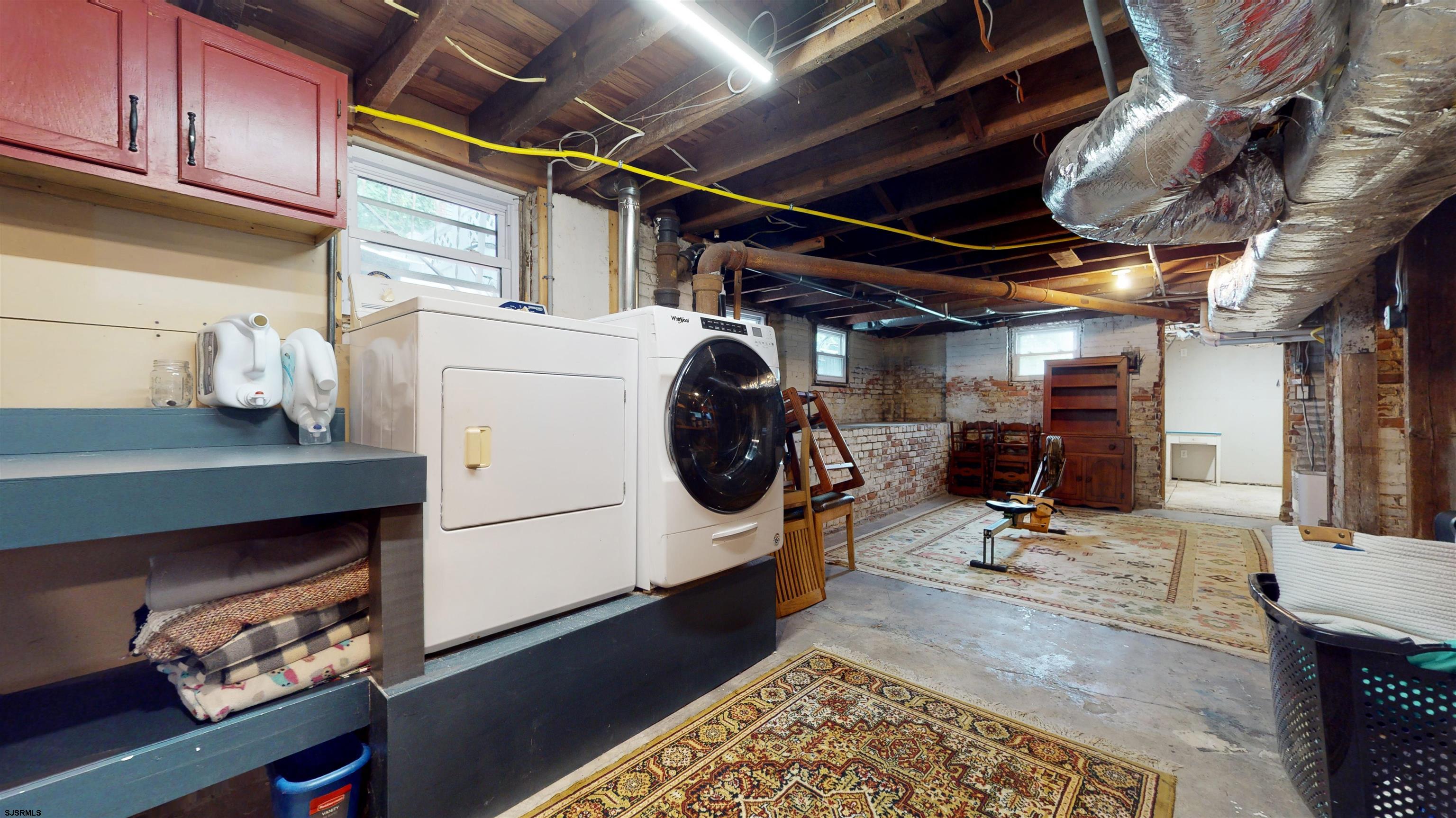 1409 Shore Road Northfield, NJ 08225 - Photo 41 of 50 a utility room with dryer and washer
