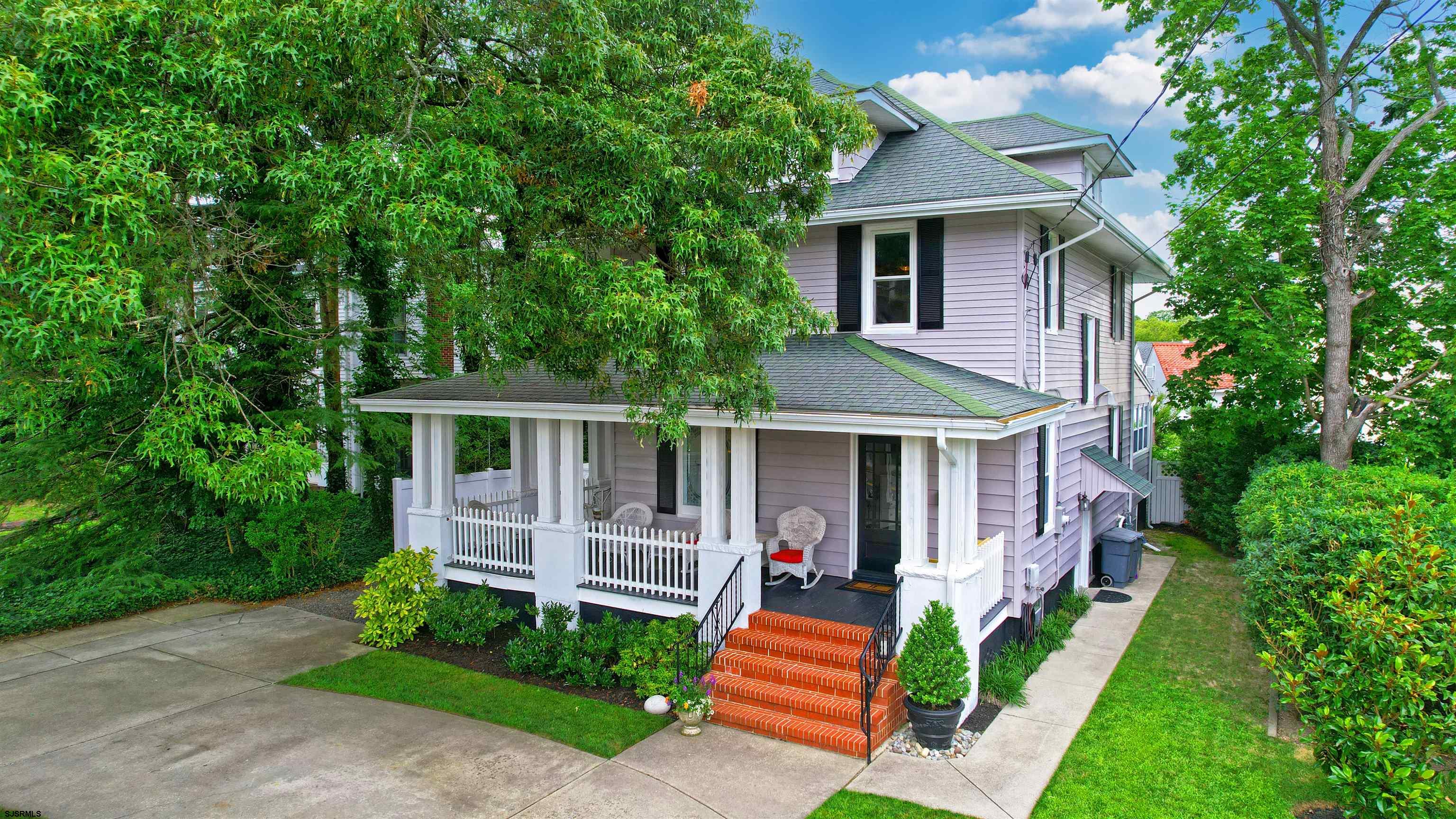 1409 Shore Road Northfield, NJ 08225 - Photo 47 of 50 a front view of house with yard and green space