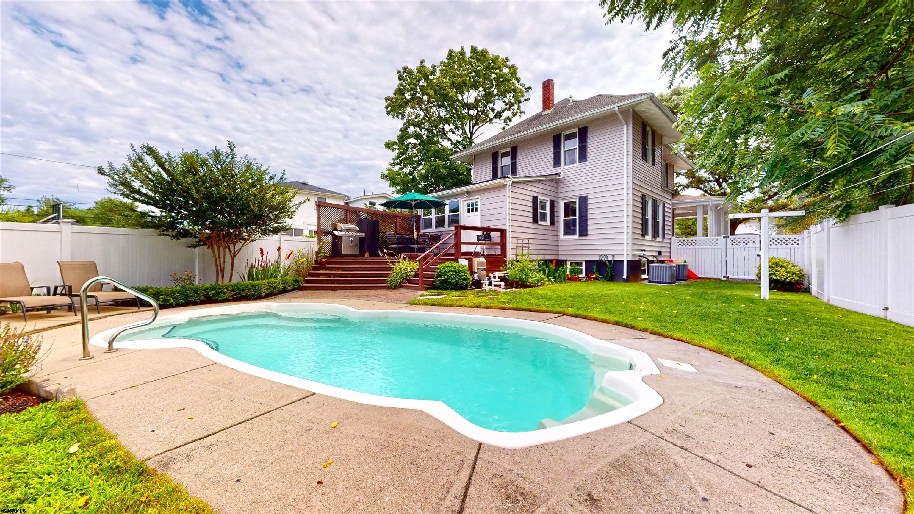 1409 Shore Road Northfield, NJ 08225 - Photo 5 of 50 a house with garden in front of it