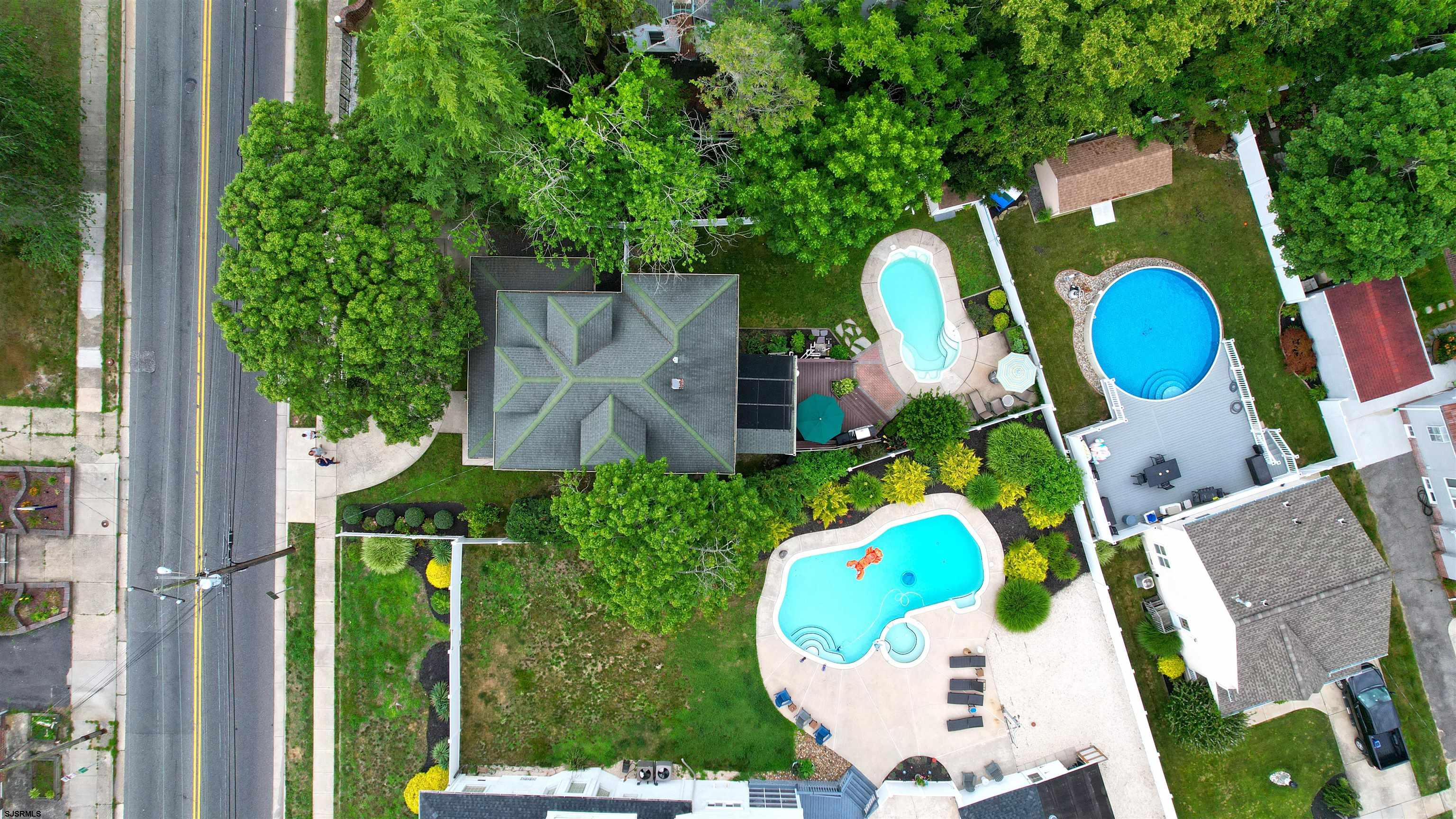 1409 Shore Road Northfield, NJ 08225 - Photo 7 of 50 a view of a house with a backyard space and balcony