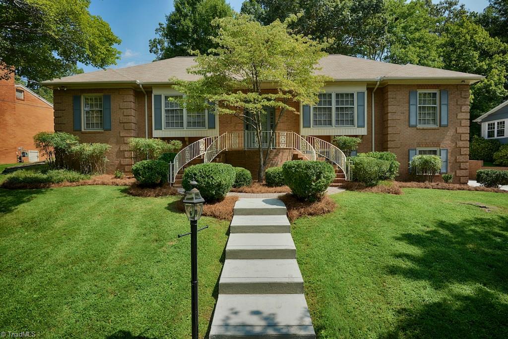 910 Wimbledon Place High Point, NC 27262 - Photo 1 of 30 Beautiful curved staircase is the entrance to this move in ready 3/2 bath home
