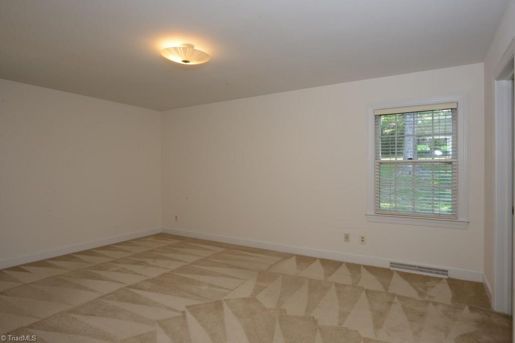 910 Wimbledon Place High Point, NC 27262 - Photo 21 of 30 Master Bedroom with en suite bath