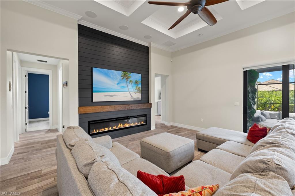 4424 Owens Way Ave Maria, FL 34142 - Photo 1 of 28 a living room with furniture a rug and a window