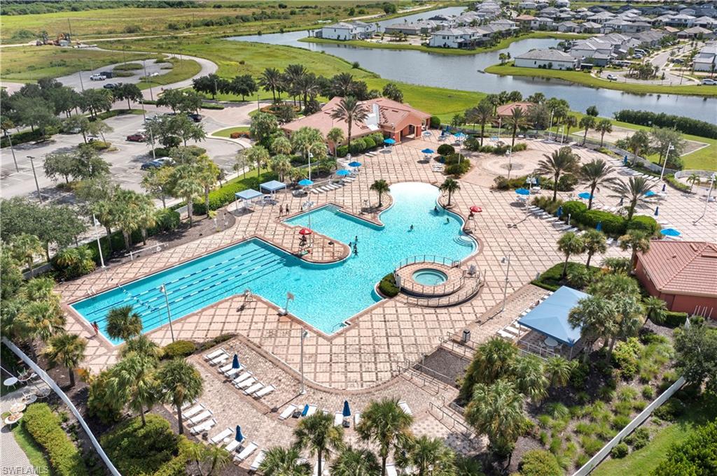 4424 Owens Way Ave Maria, FL 34142 - Photo 26 of 28 an aerial view of residential houses with outdoor space