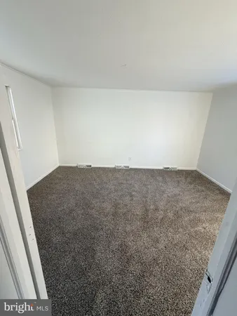 an empty room with an entryway
