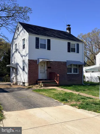 a front view of house with yard