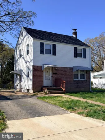 a front view of house with yard