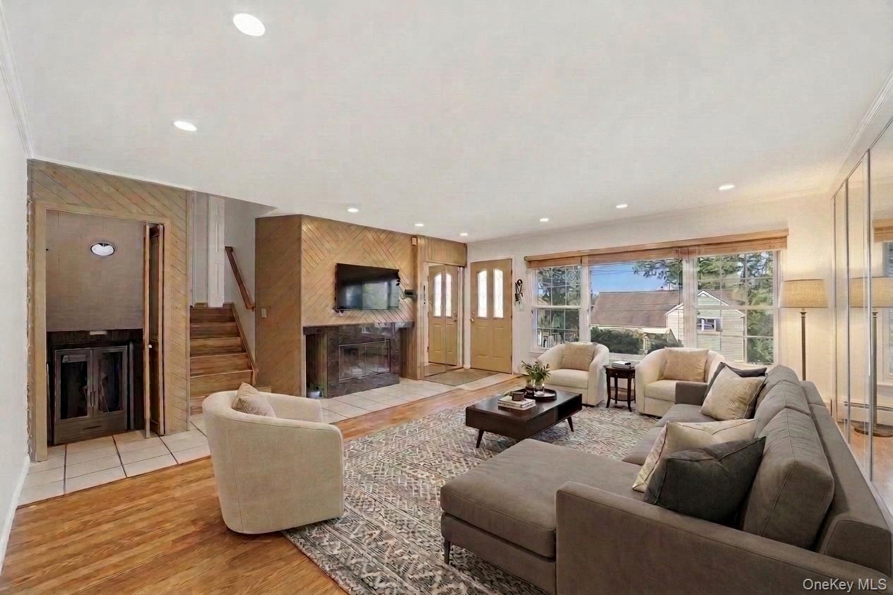 29 Montrose Road Yonkers, NY 10710 - Photo 4 of 39 Living area featuring recessed lighting and hardwood-finish flooring (Virtually Staged)