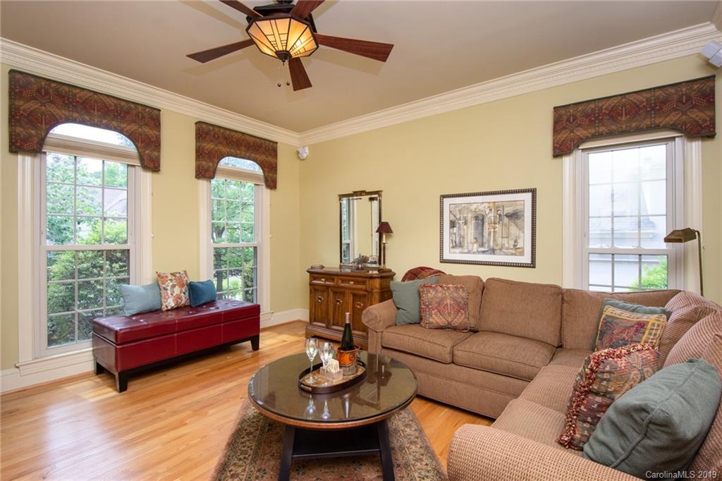 7074 Harbor Court Tega Cay, SC 29708 - Photo 6 of 36 a living room with furniture and a large window