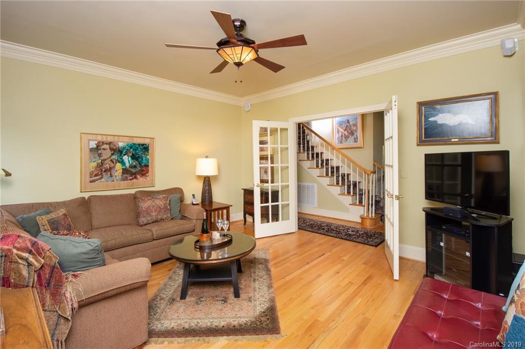 7074 Harbor Court Tega Cay, SC 29708 - Photo 7 of 36 a living room with furniture and a flat screen tv