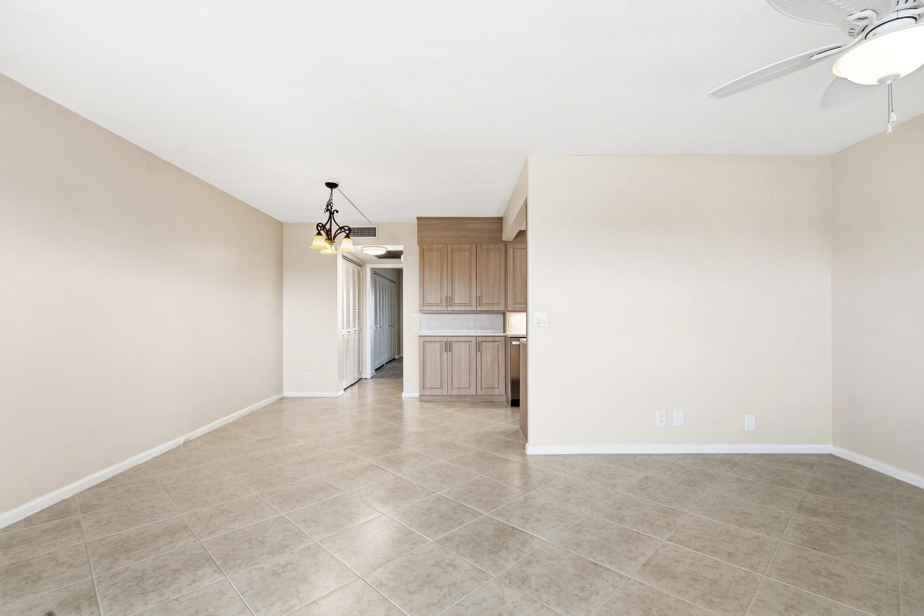 4067 Yarmouth C Boca Raton, FL 33434 - Photo 12 of 40 a view of a kitchen with a sink and refrigerator
