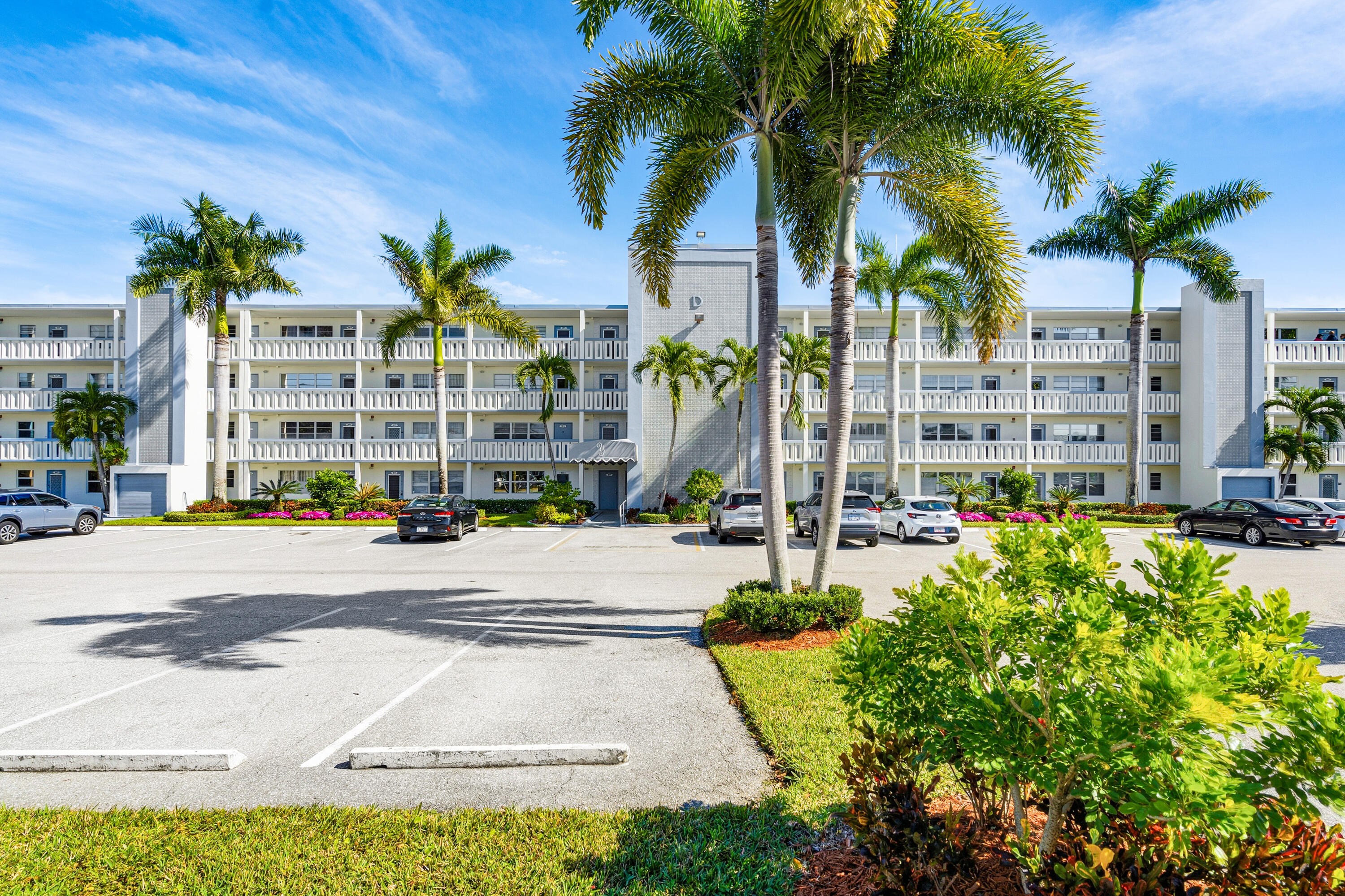 4067 Yarmouth C Boca Raton, FL 33434 - Photo 39 of 40 a view of multiple houses with palm trees