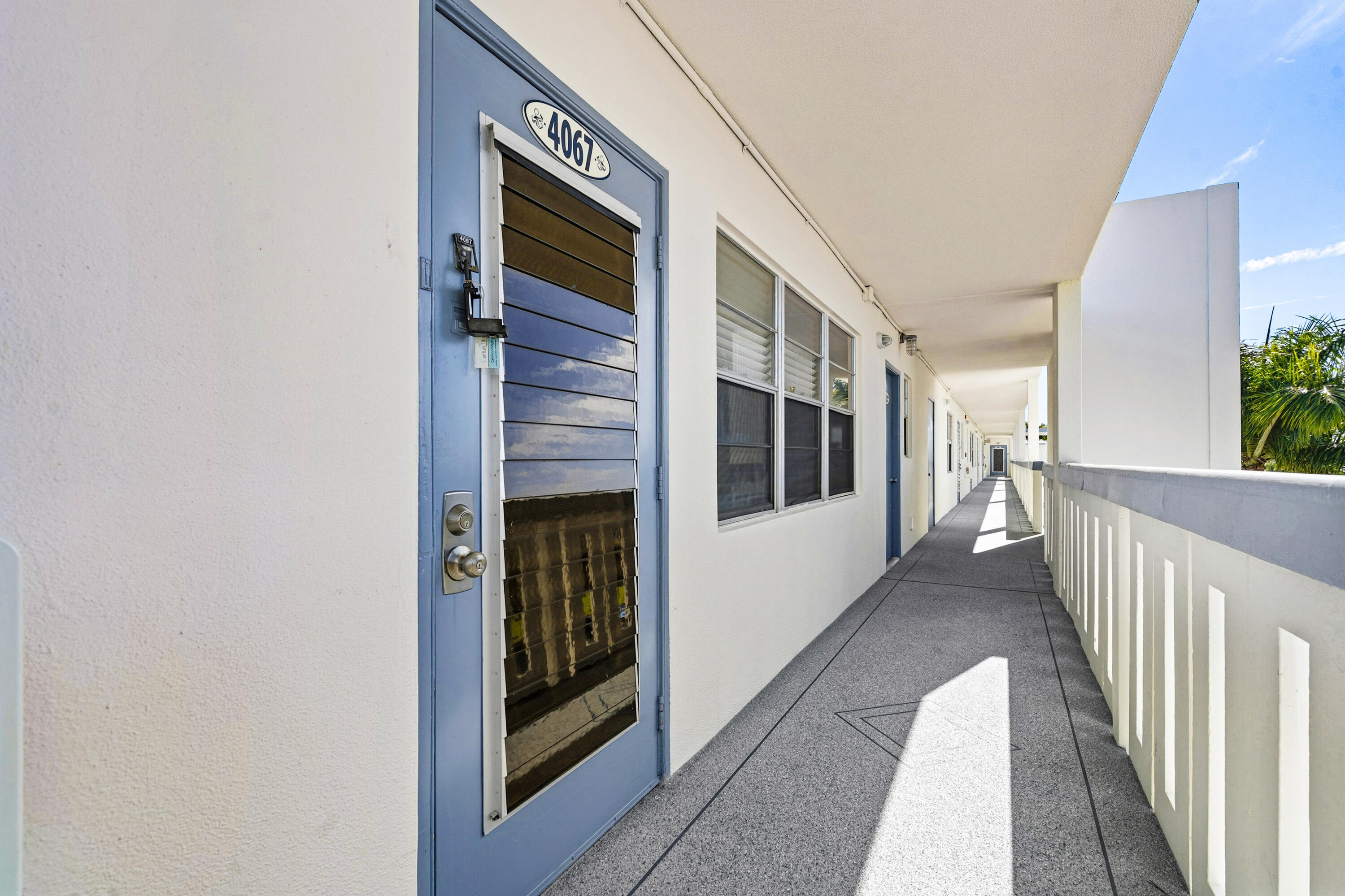 4067 Yarmouth C Boca Raton, FL 33434 - Photo 40 of 40 a view of a house with car parked