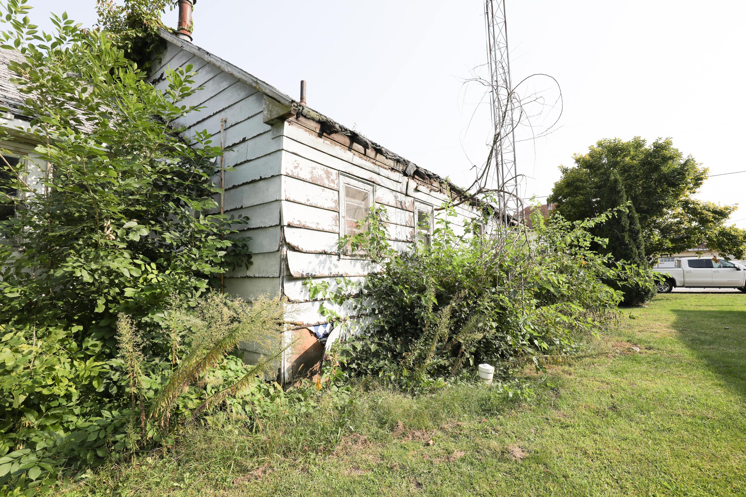 15 East Oneida Street La Crosse, IN 46348 - Photo 18 of 21 a backyard of a house with lots of green space