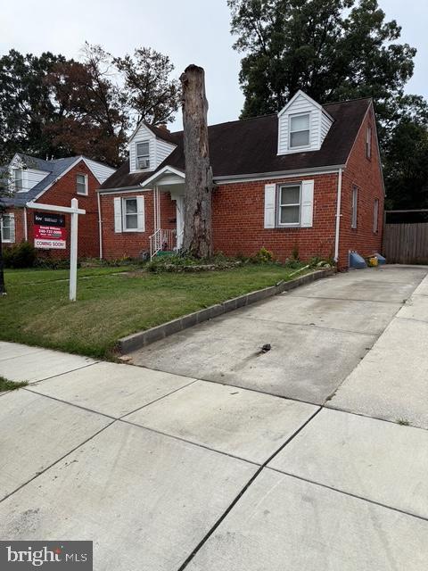 2205 Calvert Street Hyattsville, MD 20783 - Photo 26 of 26 a front view of a house with a yard