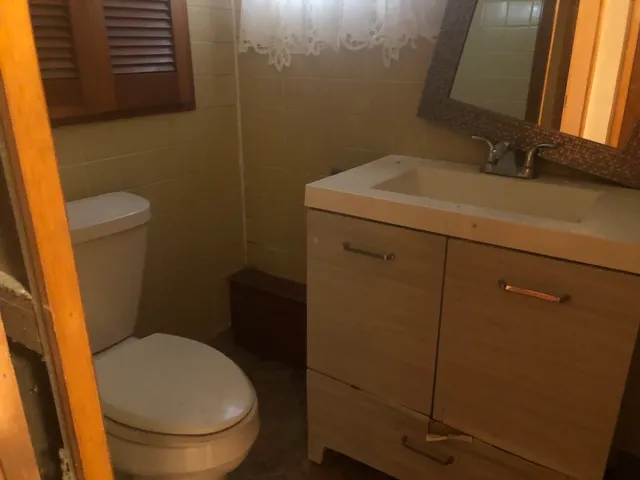 a bathroom with a sink and a toilet
