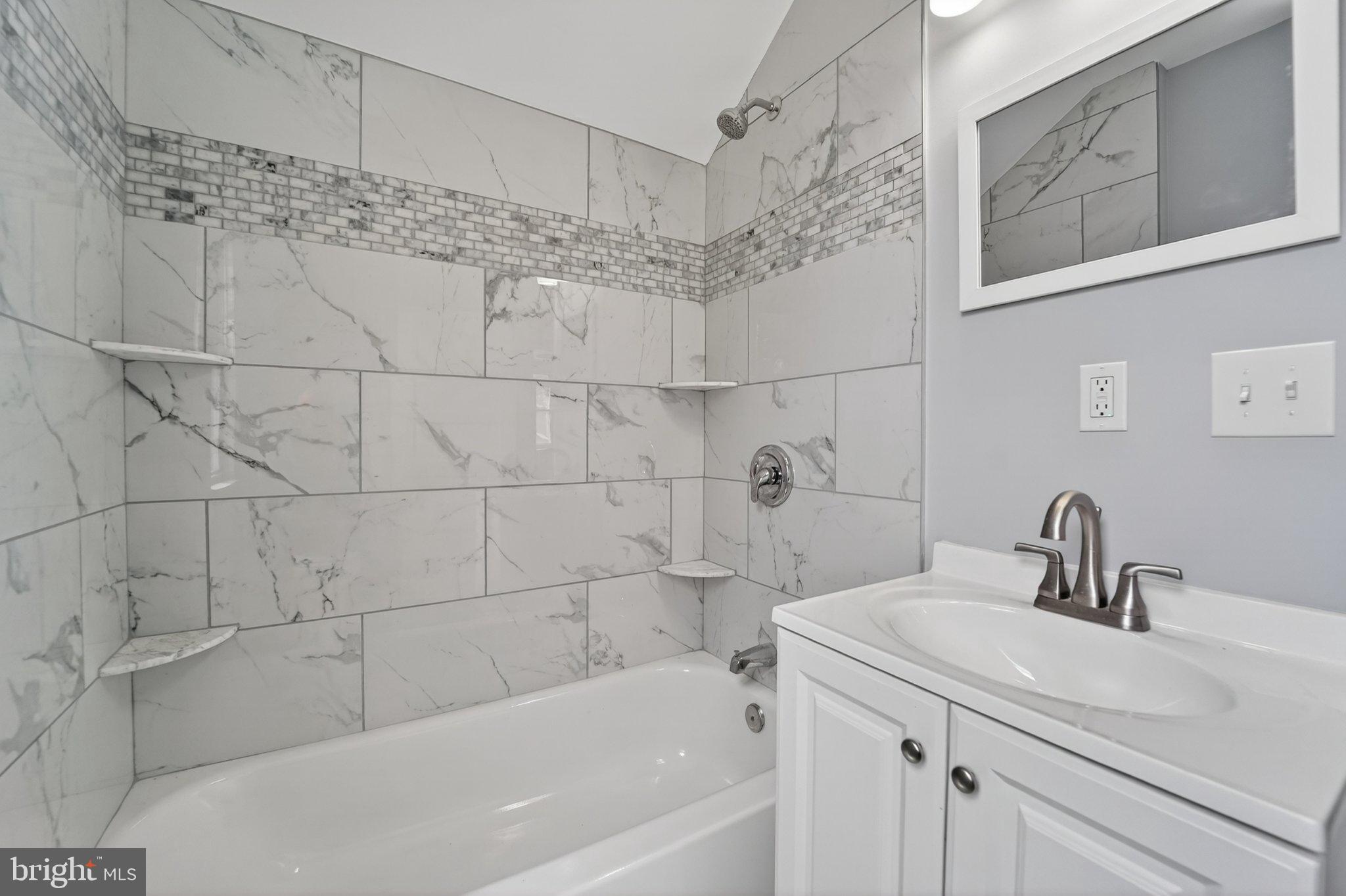5312 Catalpha Road Baltimore, MD 21214 - Photo 23 of 59 Elegant marble bath retreat.